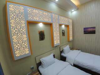 Отель Marsel Hotel Баку Четырехместный номер с видом на сад-7