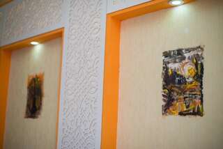 Отель Marsel Hotel Баку Четырехместный номер с видом на сад-1